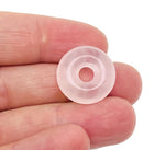 Pink rose quartz crystal donut pendant from GemstoneGO, 20mm Pi stone with smooth, polished surface and natural gemstone details