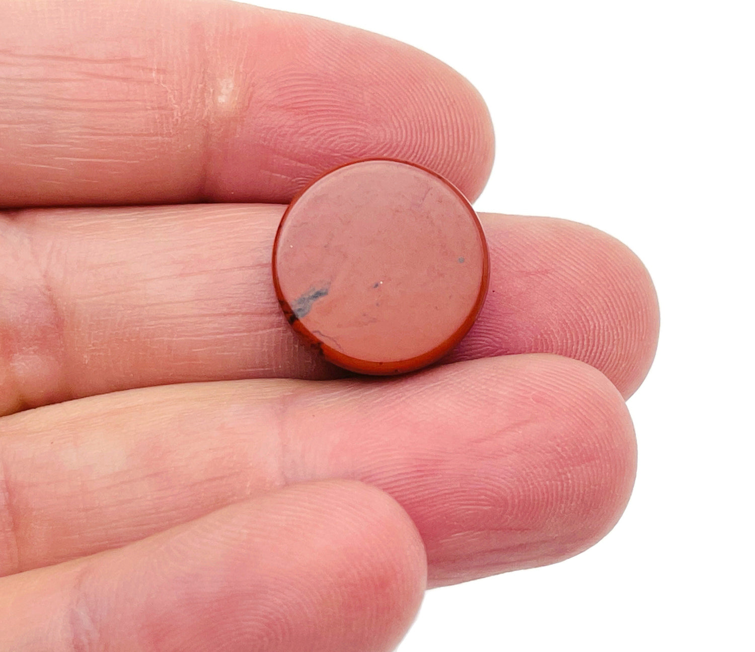 Round red jasper flat gemstone slab from GemstoneGO, showcasing vibrant red color and smooth polished surface.