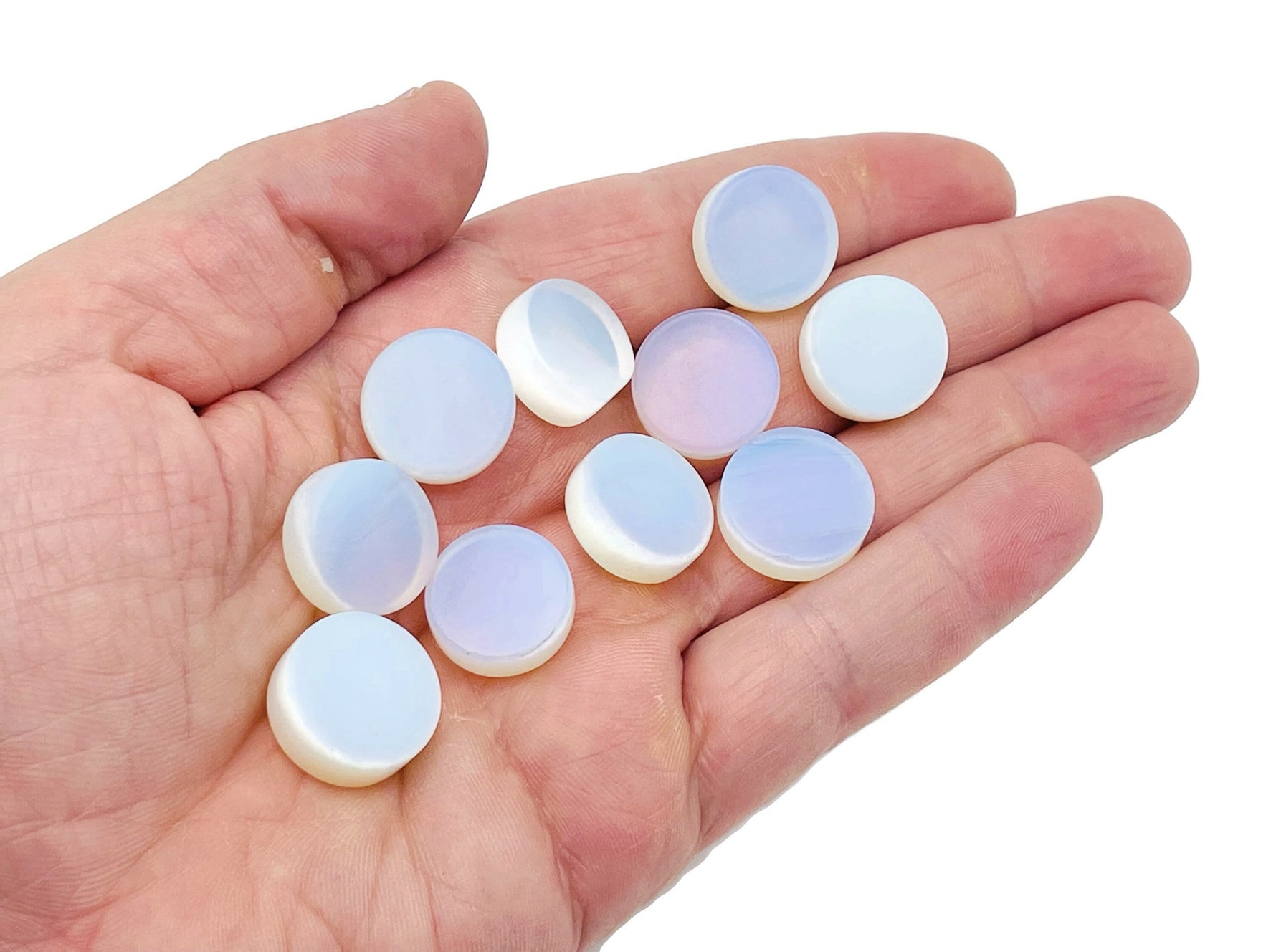 Round opalite flat gemstone slab from GemstoneGO, showcasing a smooth, iridescent crystal surface with subtle color shifts.