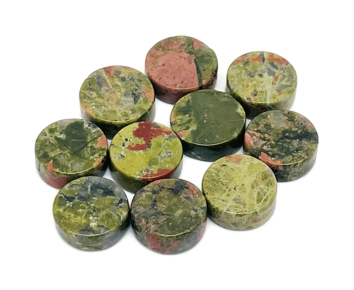 Round Unakite flat gemstone slab crystal from GemstoneGO showing a smooth, polished surface with green and pink mineral patterns.