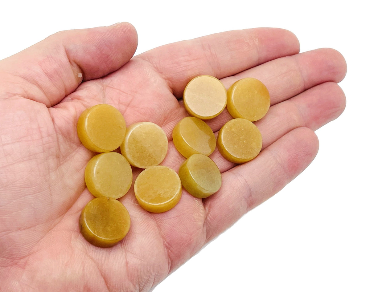 Round yellow jade flat gemstone slab from GemstoneGO, showcasing smooth polished surface and vibrant yellow color.