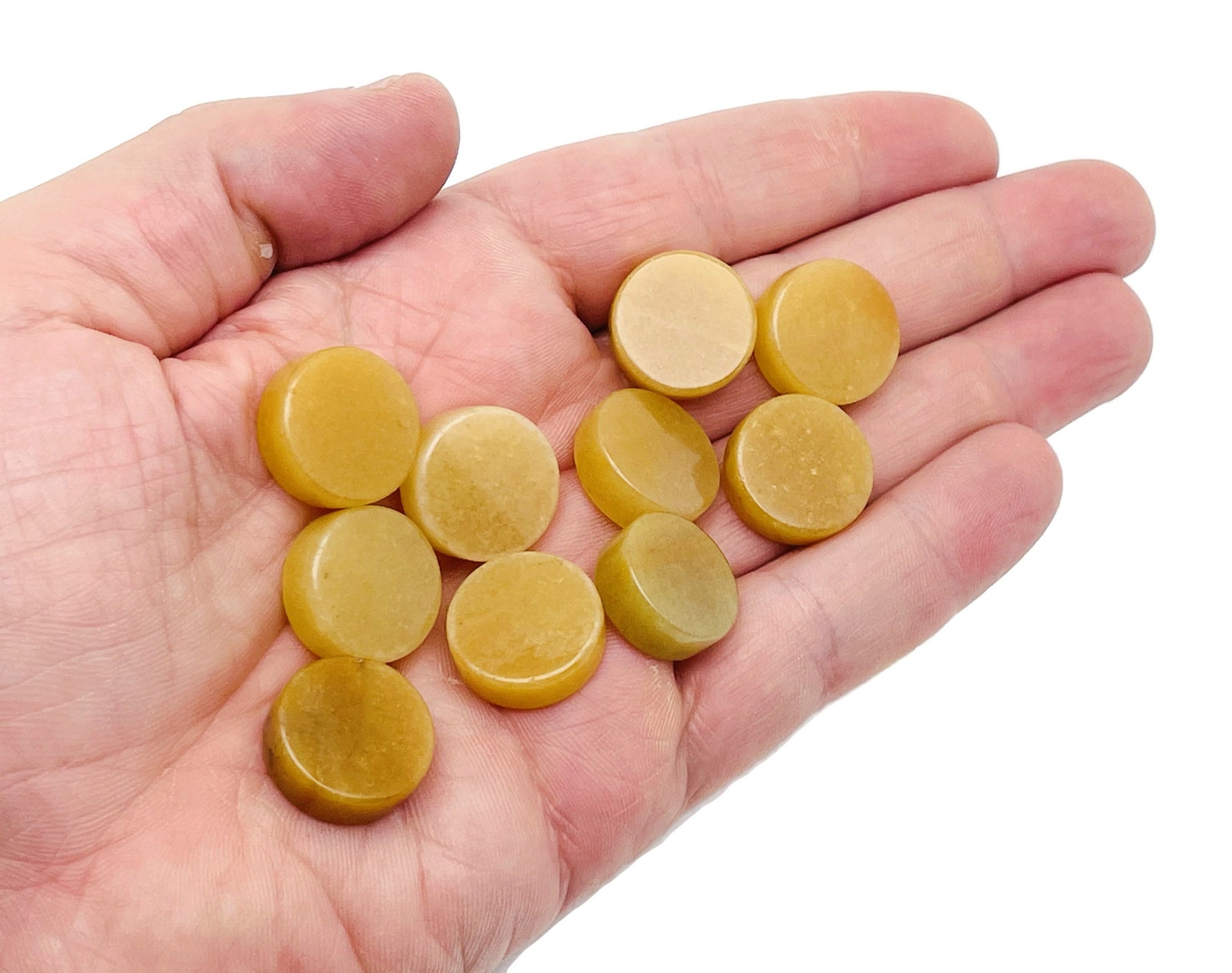 Round yellow jade flat gemstone slab from GemstoneGO, showcasing smooth polished surface and vibrant yellow color.