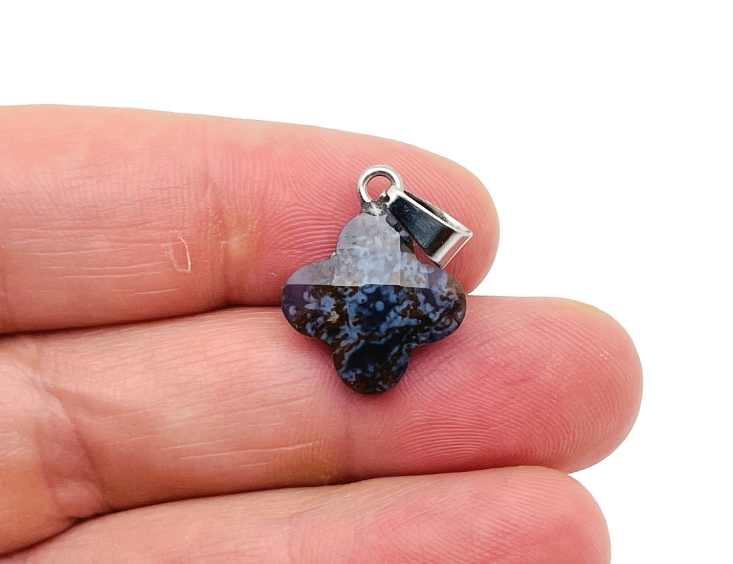 Moss agate four-leaf clover crystal pendant by GemstoneGO, showcasing a detailed green gemstone with silver bail for jewelry making.