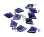 Amethyst triangle gemstone pendant from GemstoneGO featuring a geometric design on a silver chain.