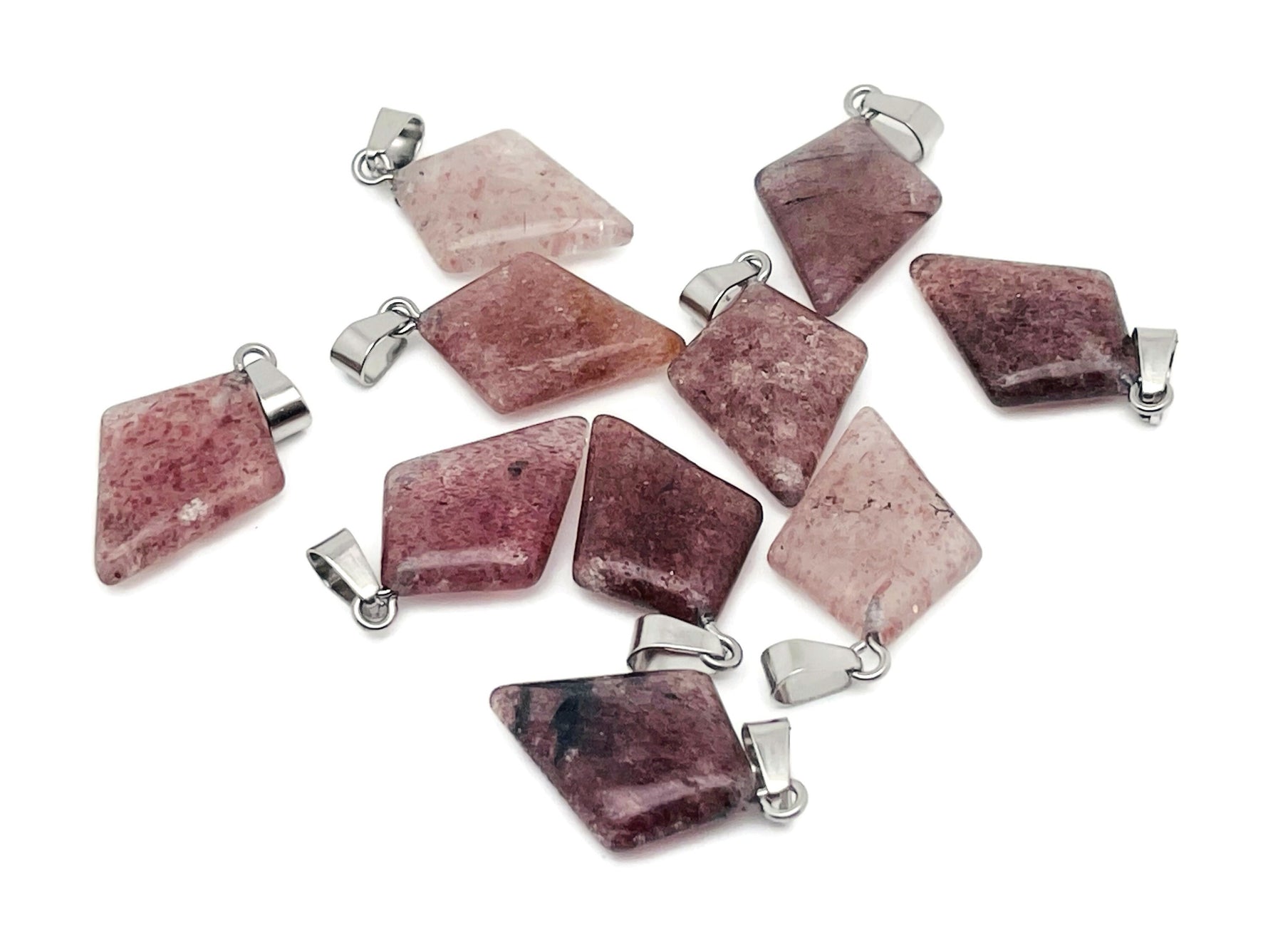 Strawberry Quartz triangle gemstone pendant featuring a geometric design, crafted by GemstoneGO.