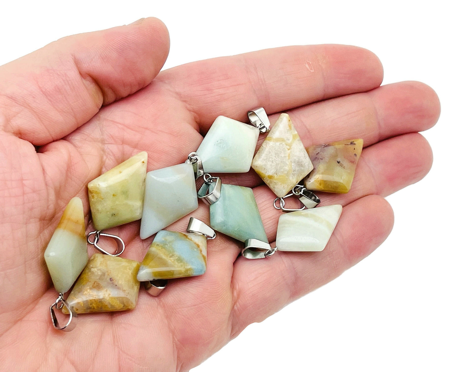 Amazonite triangle gemstone pendant featuring a geometric design, showcasing the vibrant blue-green color and polished surface.