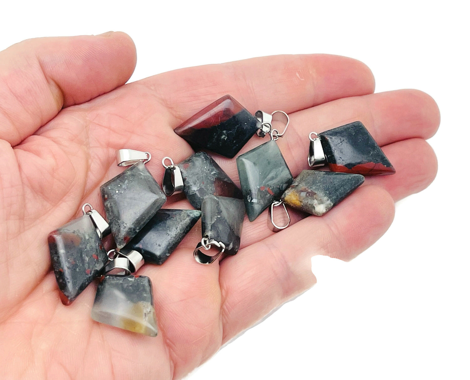 African Bloodstone triangle gemstone pendant with geometric design, featuring a dark green and red bloodstone stone.