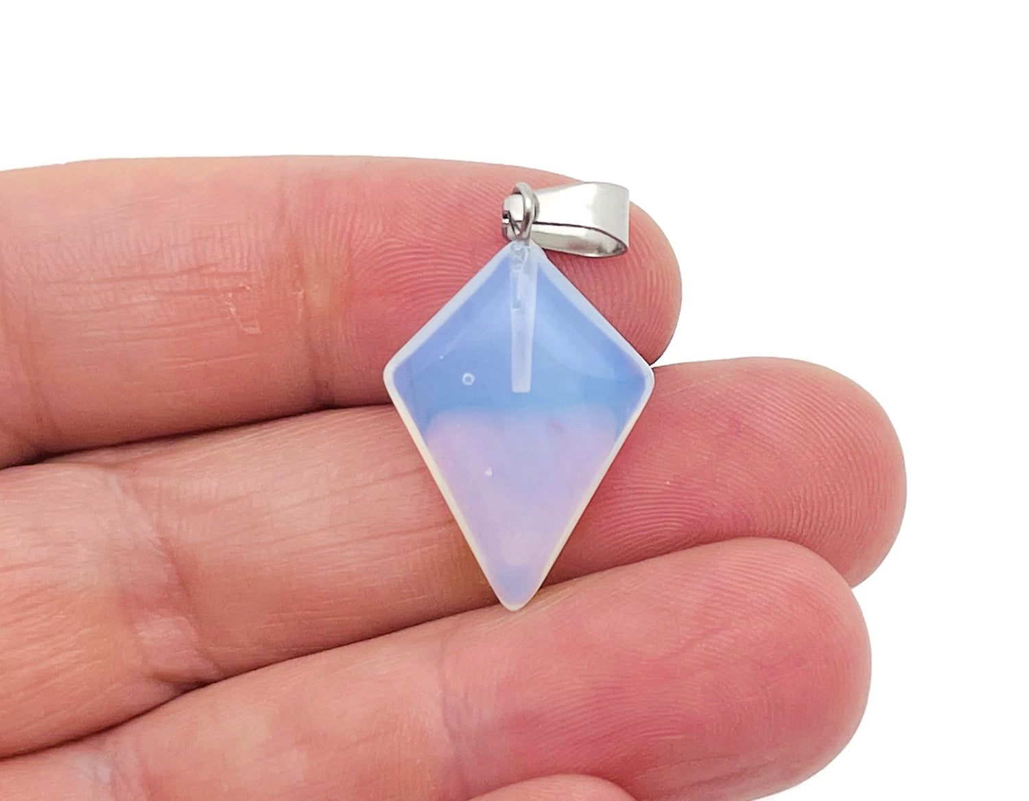 Opalite triangle gemstone pendant from GemstoneGO, featuring a geometric design and polished finish.
