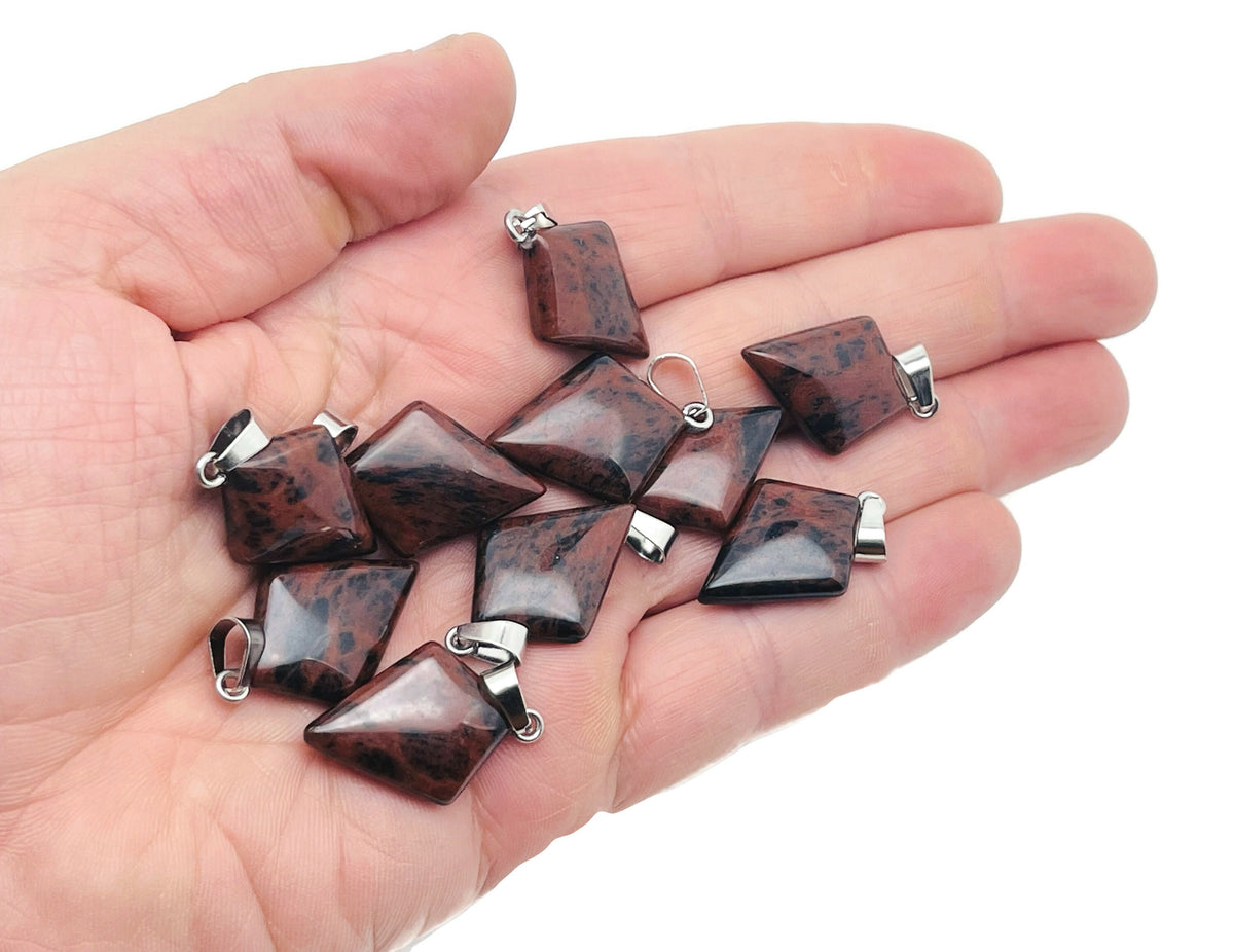 Mahogany Obsidian triangle gemstone pendant with geometric design, crafted by GemstoneGO, showcasing smooth polished surfaces.