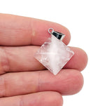 Clear quartz pyramid gemstone pendant from GemstoneGO, showcasing a natural, polished quartz pyramid on a delicate chain.