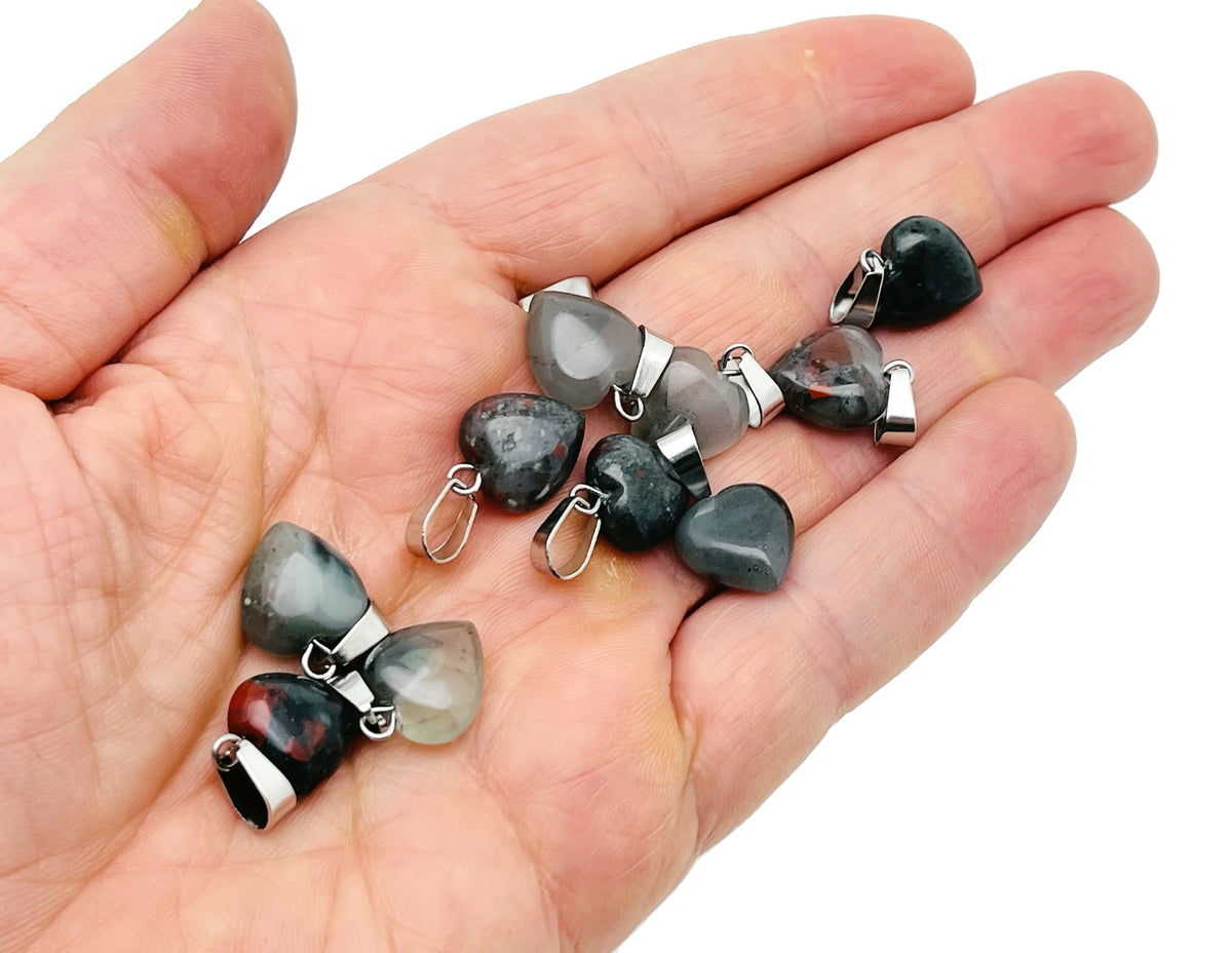 Mini African Bloodstone heart pendant by GemstoneGO featuring a polished bloodstone crystal with a silver bail.