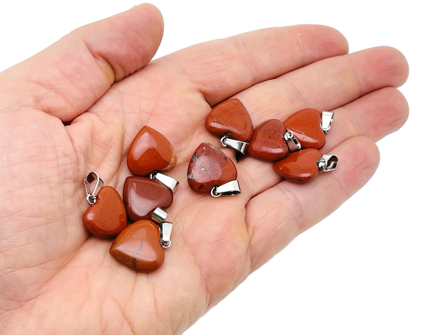 Red Jasper heart pendant by GemstoneGO, featuring a mini crystal design with a polished red jasper stone on a chain.