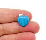 Mini turquoise heart pendant with crystal accents from GemstoneGO, showcasing a delicate jewelry piece with vibrant color and intricate details.