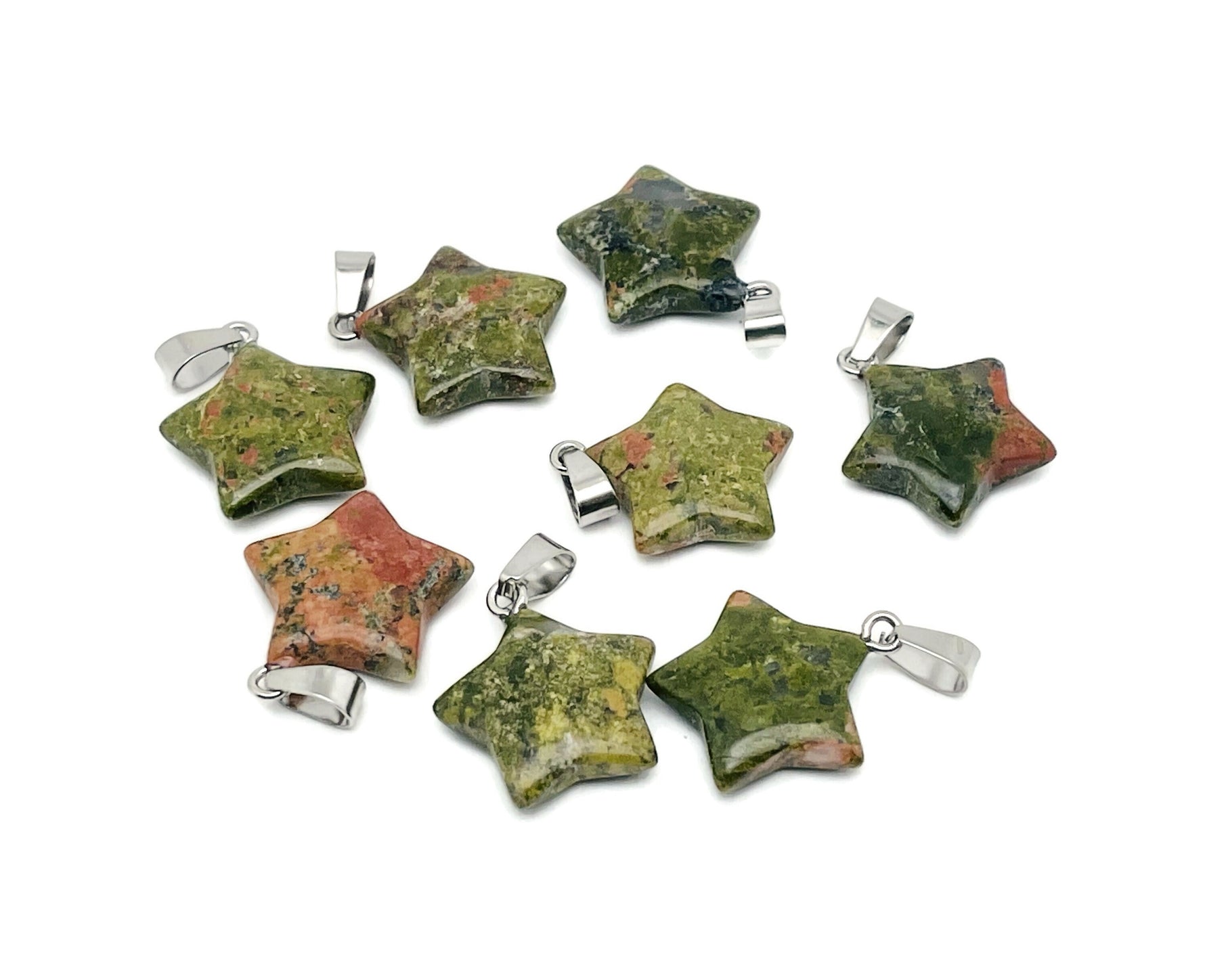 Unakite star-shaped crystal pendant from GemstoneGO, ideal for jewelry making and craft projects.