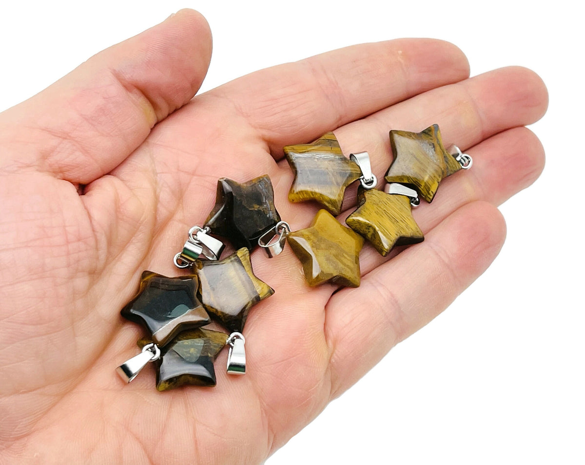 Tiger Eye star pendant from GemstoneGO, a polished crystal jewelry-making supply featuring a star-shaped design.