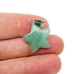 Aventurine star-shaped crystal pendant from GemstoneGO, perfect for jewelry making, with a smooth polished surface and vibrant green color.