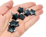 Obsidian star crystal pendant from GemstoneGO, natural black gemstone jewelry making supply with a polished star shape.