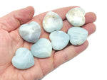 Amazonite heart gemstone pendant, 30mm, from GemstoneGO featuring a vibrant blue-green polished stone on a string.