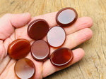 Carnelian flat gemstone slab from GemstoneGO, measuring 30x25x7 cm, showcasing vibrant orange-red crystal with natural patterns.
