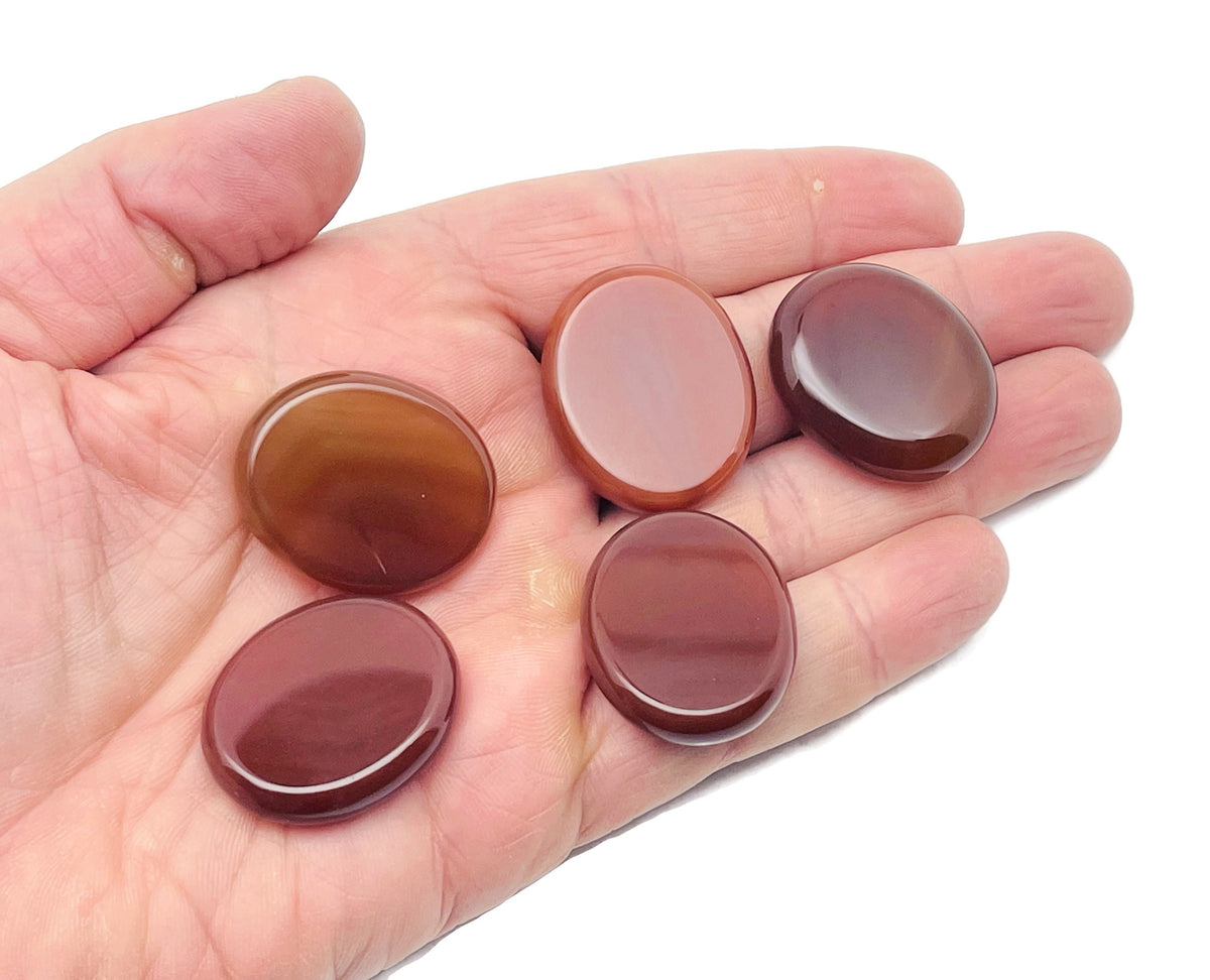 Carnelian flat gemstone slab from GemstoneGO, measuring 30x25x7 mm, featuring vibrant orange-red crystal with smooth polished surface.