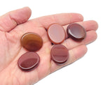 Carnelian flat gemstone slab from GemstoneGO, measuring 30x25x7 mm, featuring vibrant orange-red crystal with smooth polished surface.