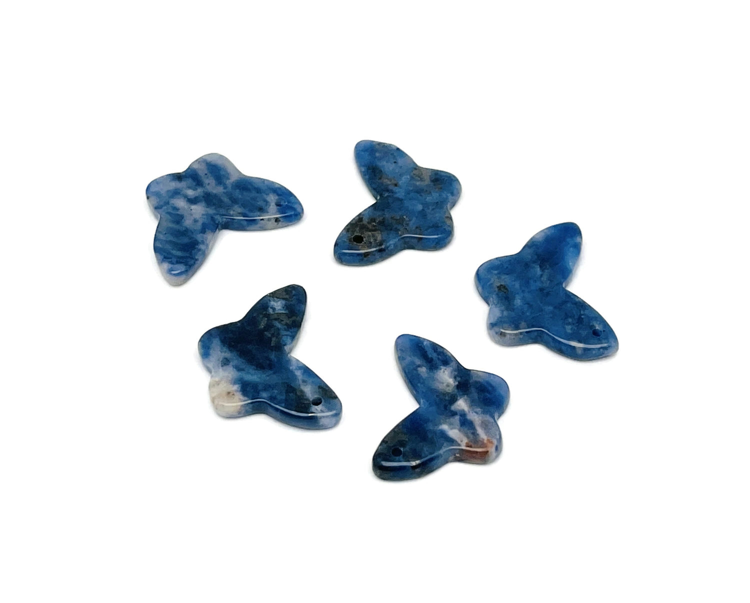 Sodalite mini butterfly gemstone pendant from GemstoneGO featuring a hole crystal jewelry design, displayed against a neutral background.