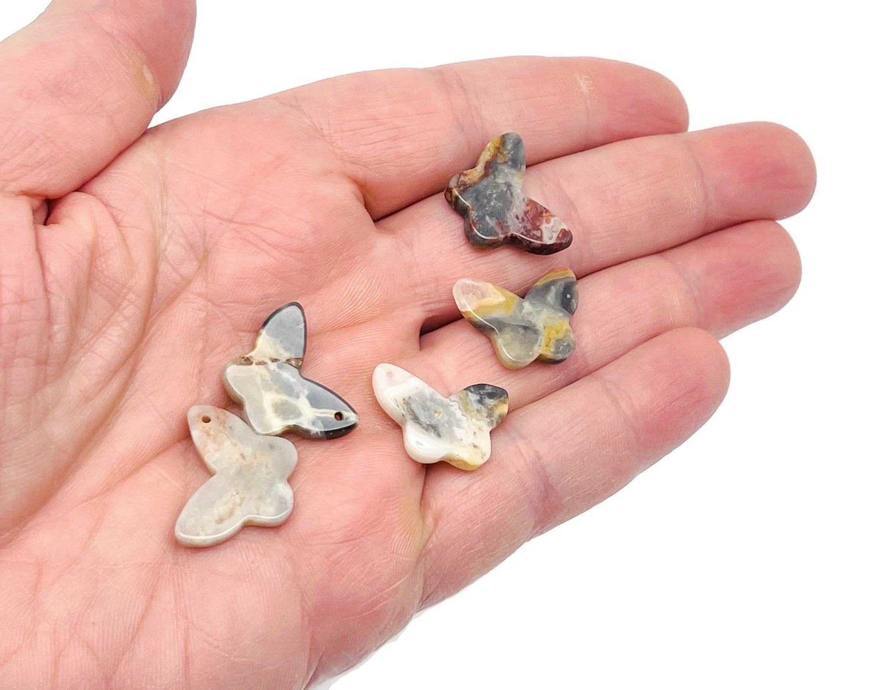 Crazy Lace Agate mini butterfly gemstone pendant featuring hole crystal jewelry from GemstoneGO, showcasing colorful lace patterns.