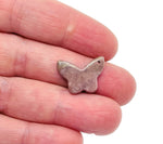 Rhodonite mini butterfly gemstone pendant with hole for necklace, showcasing vibrant pink and black patterns, by GemstoneGO.