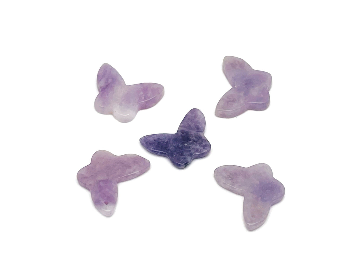 Lepidolite mini butterfly gemstone pendant with hole for jewelry, showcasing purple crystal and delicate butterfly shape.