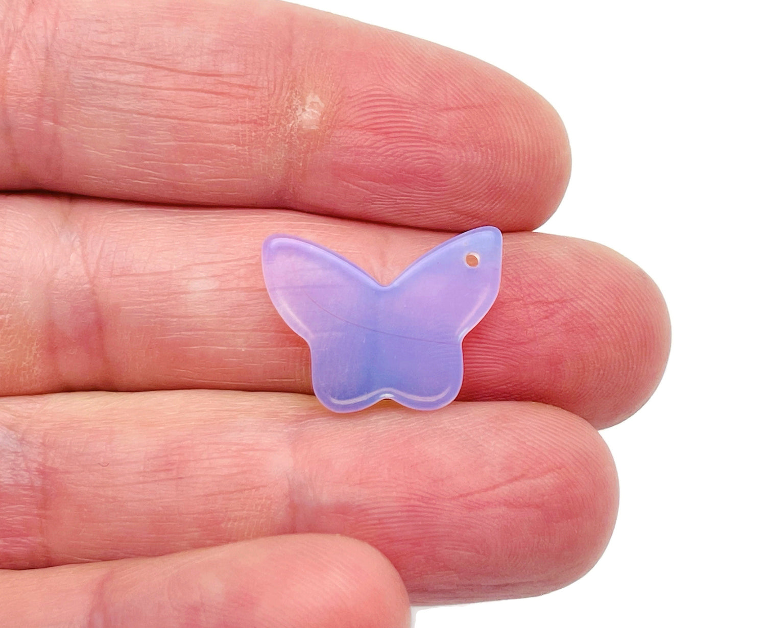 Opalite mini butterfly gemstone pendant with hole for jewelry, showcasing a delicate crystal charm from GemstoneGO.