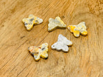 Colorful Crazy Lace Agate butterfly gemstone pendant with drilled hole for jewelry, showcasing vibrant patterns and natural stone details.