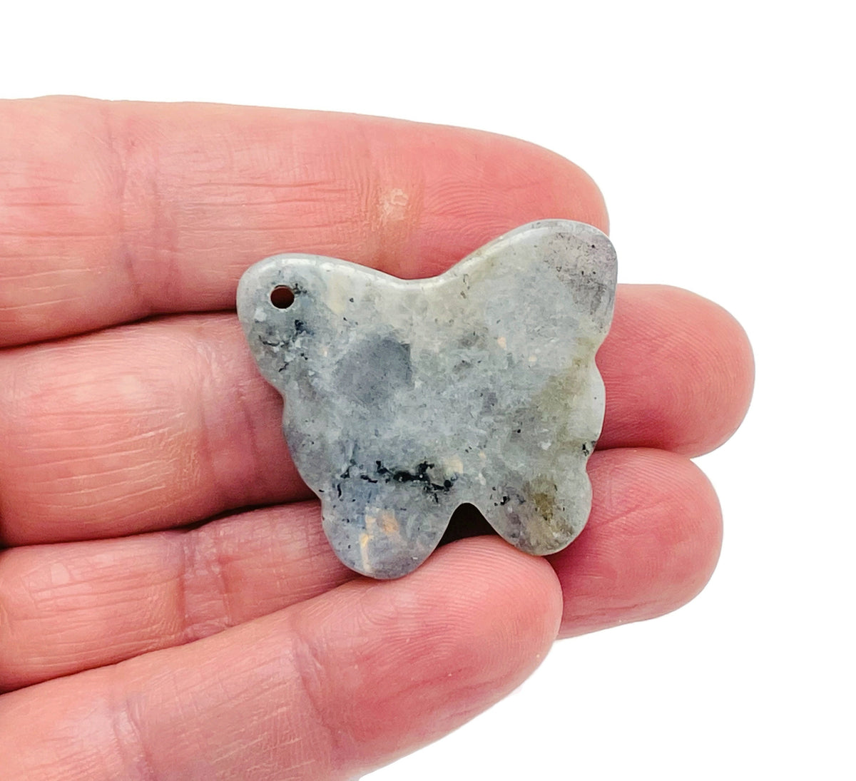 Labradorite butterfly gemstone pendant with hole crystal jewelry from GemstoneGO, showcasing vibrant iridescent colors and intricate butterfly shape.