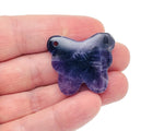 Amethyst butterfly gemstone pendant with hole crystal jewelry from GemstoneGO, showcasing a purple amethyst butterfly design.