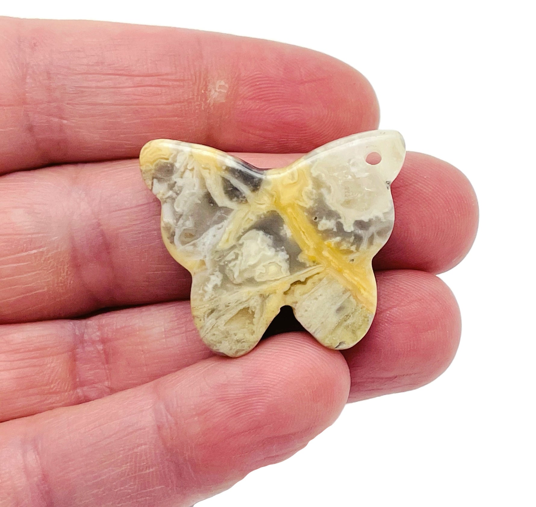 Crazy Lace Agate butterfly gemstone pendant from GemstoneGO, featuring colorful lace patterns on a crystal pendant with a hole for jewelry.