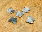 Labradorite butterfly gemstone pendant with hole crystal jewelry, showcasing iridescent stone and butterfly shape.