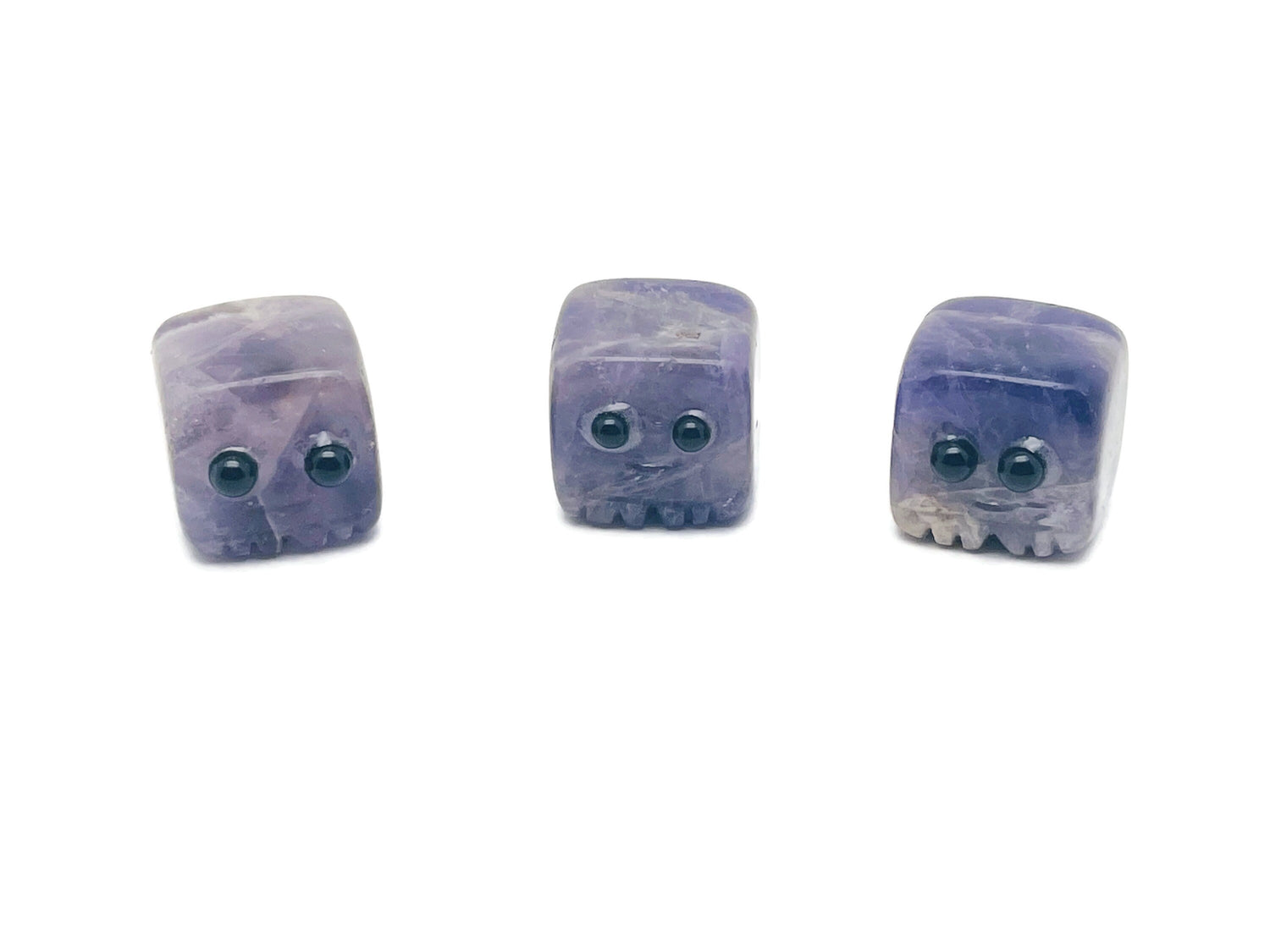 Amethyst handmade gemstone carving skull with detailed features, perfect as a crystal gift for kids from GemstoneGO.