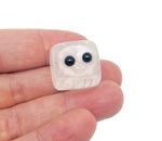 Clear quartz handmade carving skull gemstone by GemstoneGO, featuring intricate details and a polished, transparent crystal finish.