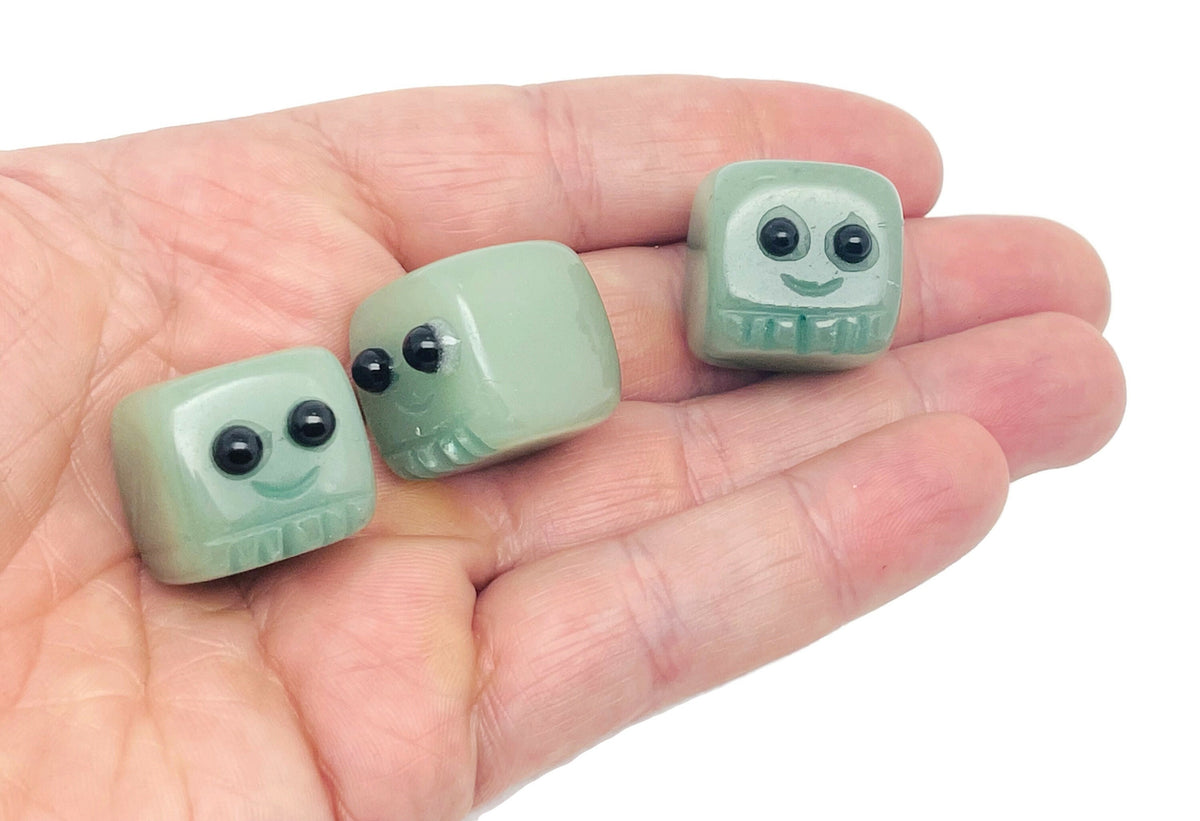 Handmade aventurine gemstone skull carving, detailed crystal sculpture, suitable as a unique gift for kids by GemstoneGO.
