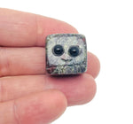 Handmade dragon blood jasper skull gemstone carving with detailed features, ideal as a crystal gift for kids by GemstoneGO