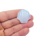 Opalite sea shell carving gemstone, 30mm, from GemstoneGO, featuring a smooth shell shape with iridescent opalite details.