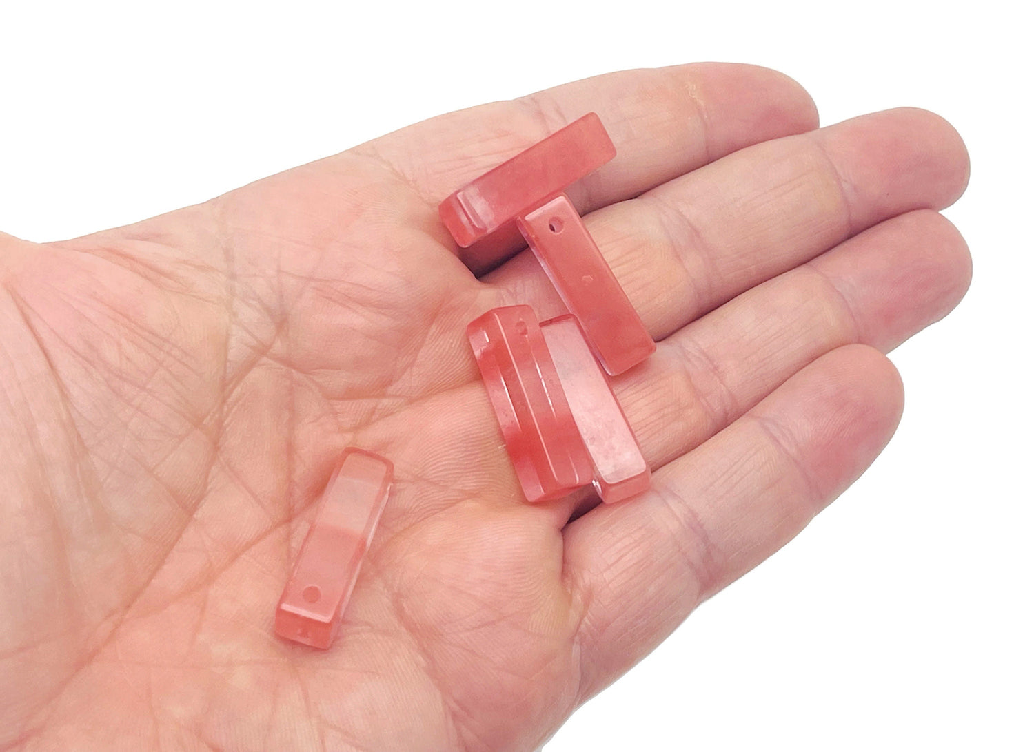 Cherry quartz crystal pendant from GemstoneGO, drilled gemstone for jewelry making, showcasing vibrant red quartz gemstone on a white background