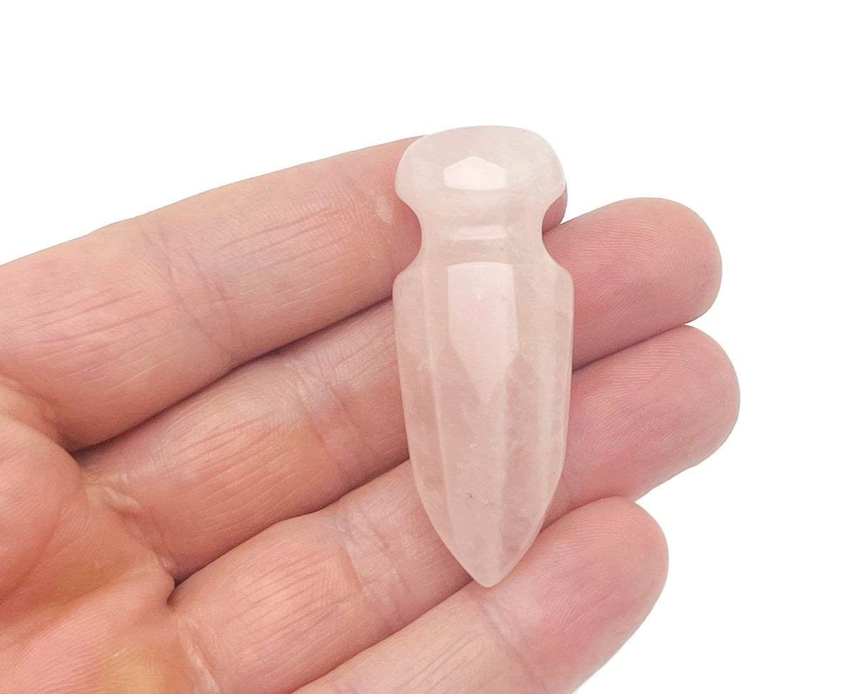 Carved rose quartz sword dagger gemstone, 50mm, with detailed craftsmanship and natural pink color, by GemstoneGO.