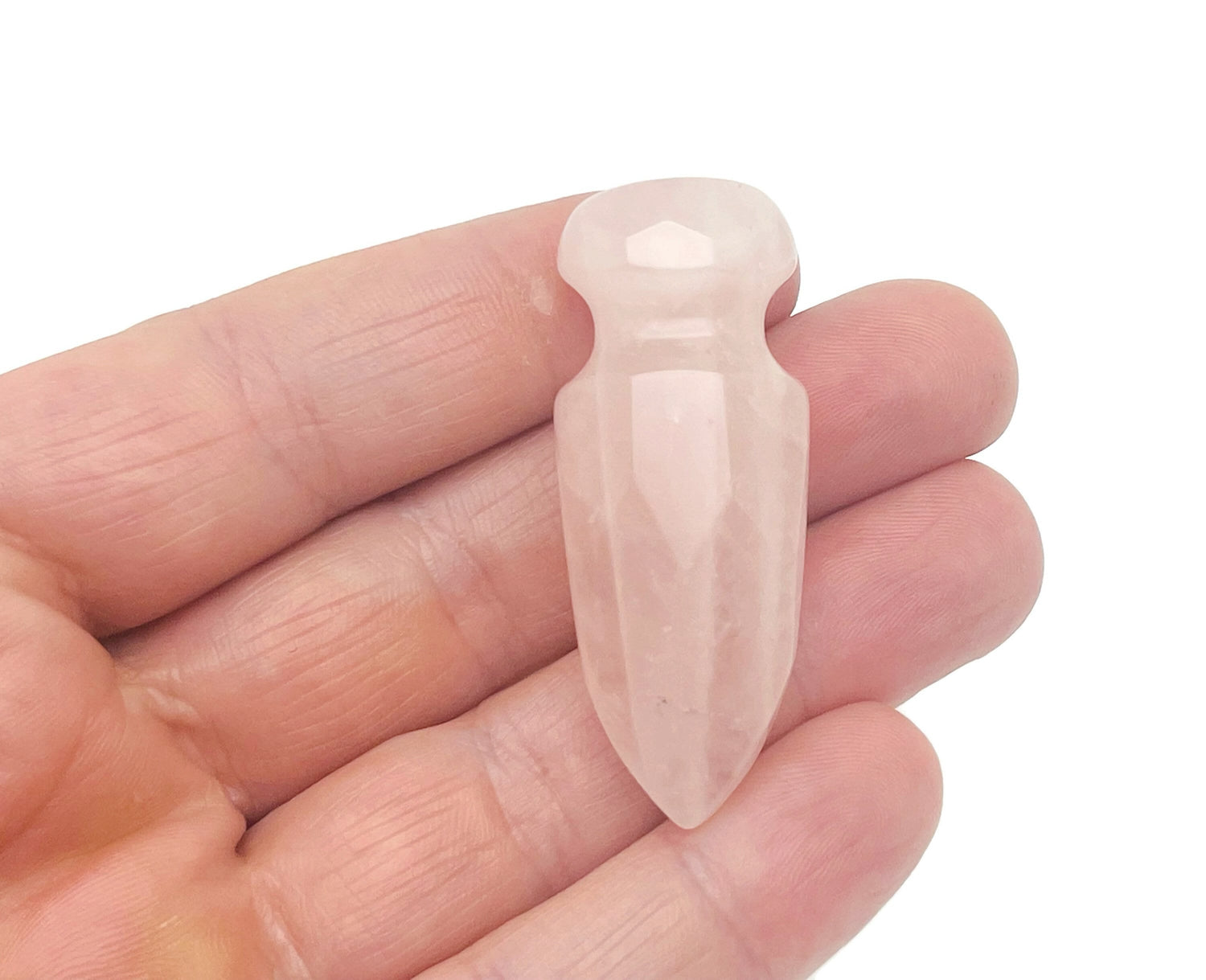 Carved rose quartz sword dagger gemstone, 50mm, with detailed craftsmanship and natural pink color, by GemstoneGO.