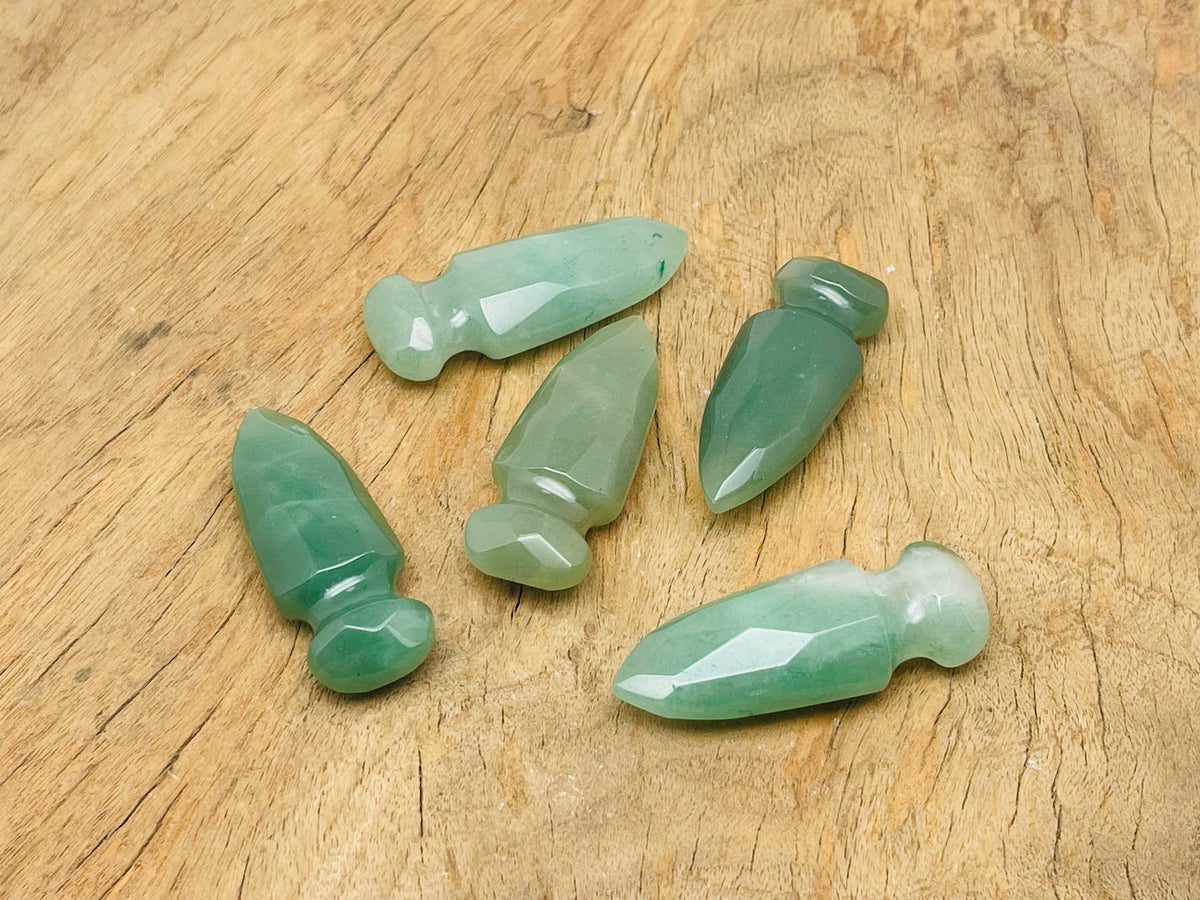 Carved aventurine gemstone sword dagger measuring 50mm, with detailed craftsmanship and vibrant green color from GemstoneGO.