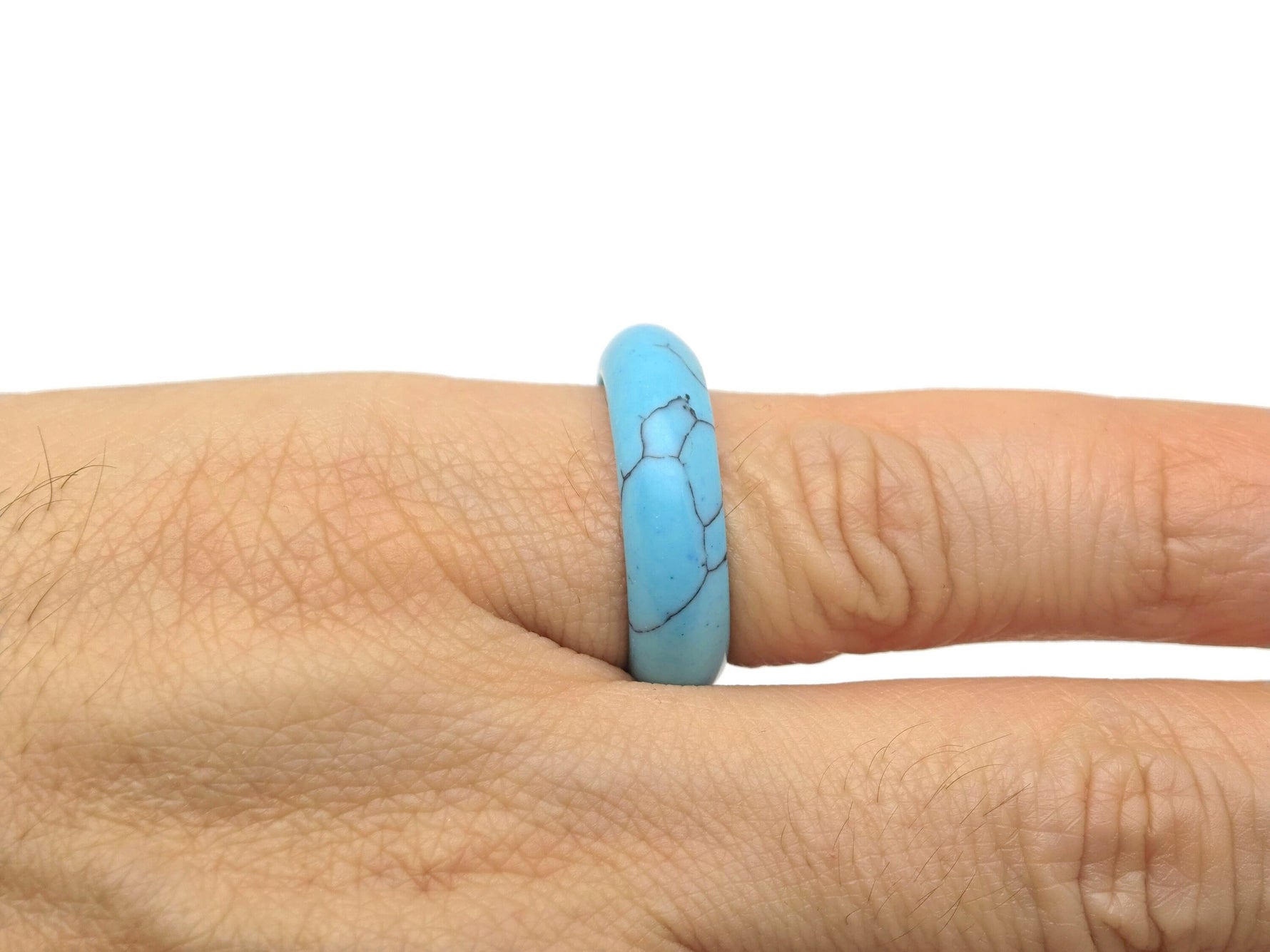 Turquoise crystal ring from GemstoneGO featuring a vibrant turquoise stone set in a silver band.
