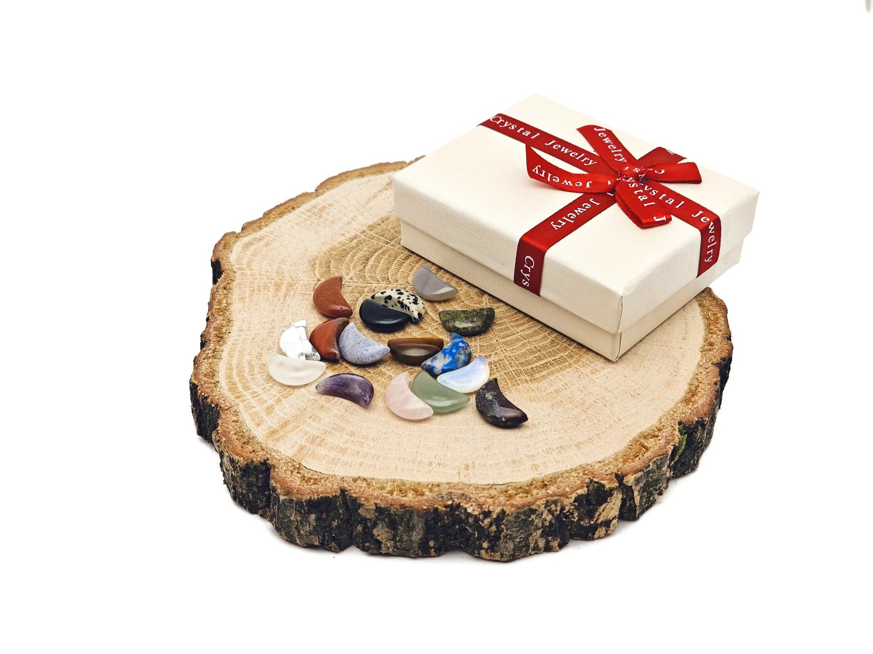 Set of 10 random gemstone crystals from GemstoneGO's Crystal Mystery Box, featuring moon carvings for crystal healing and decoration.