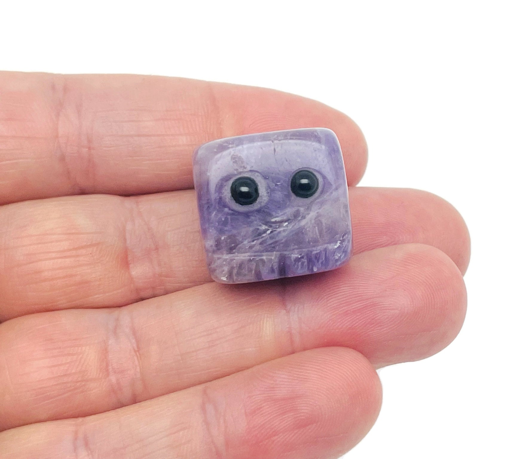 Handmade amethyst gemstone carving skull, detailed crystal sculpture by GemstoneGO, suitable as a unique gift for kids.