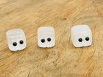 Handmade clear quartz carving of a skull gemstone by GemstoneGO, detailed crystal gift suitable for kids or collectors