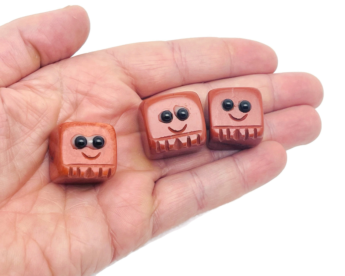 Red Jasper handmade carving skull gemstone by GemstoneGO, showcasing a detailed red stone skull sculpture for crystal gift or collection.
