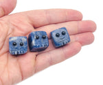 Handmade sodalite gemstone skull carving with blue and white patterns, perfect as a crystal gift for kids from GemstoneGO.